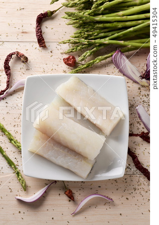raw codfish, wild asparagus, chilies and onion. raw codfish, wild asparagus, chilies and onion. 49415304