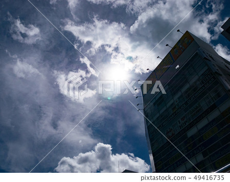 Light through the clouds in the city Light through the clouds in the city 49416735