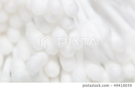 White eared cotton swabs as a background 49418039