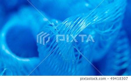 Blue synthetic sponge as an abstract background 49418307