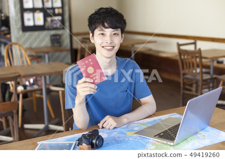 A young man who plans to travel abroad 49419260