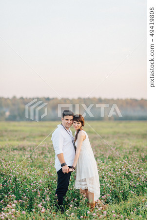 Love story of beautiful young couple at nature Love story of beautiful young couple at nature 49419808