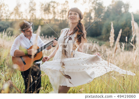 Love story of beautiful young couple at nature Love story of beautiful young couple at nature 49419860