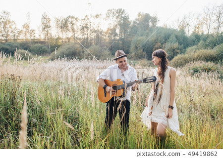 Love story of beautiful young couple at nature Love story of beautiful young couple at nature 49419862