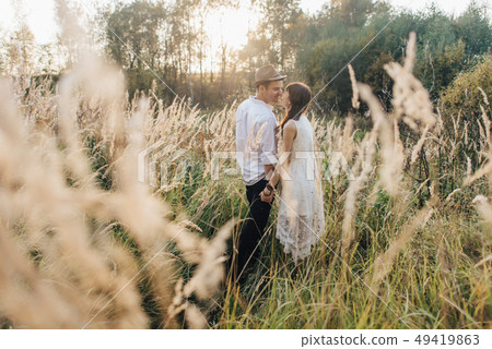 Love story of beautiful young couple at nature 49419863