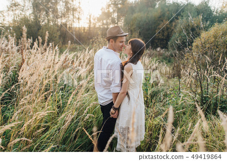 Love story of beautiful young couple at nature Love story of beautiful young couple at nature 49419864