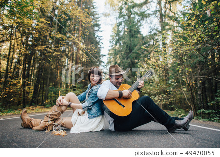 Love story of beautiful young couple at nature 49420055