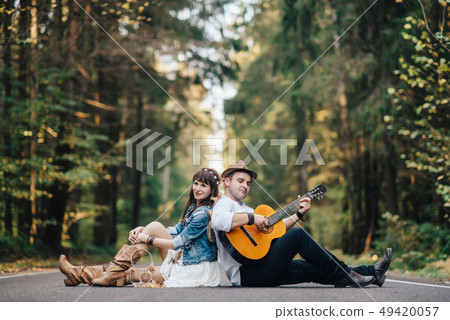 Love story of beautiful young couple at nature 49420057