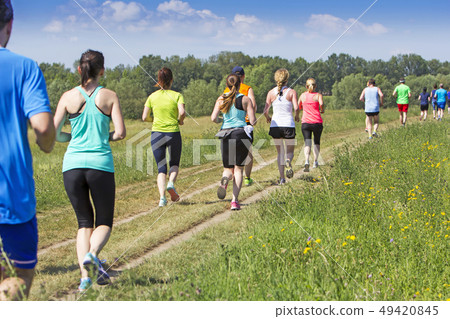 A lot of people on Marathon running in nature 49420845