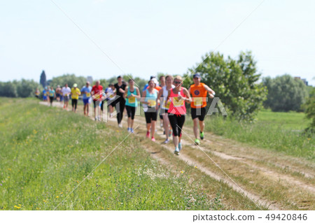 A lot of people on Marathon running in nature 49420846