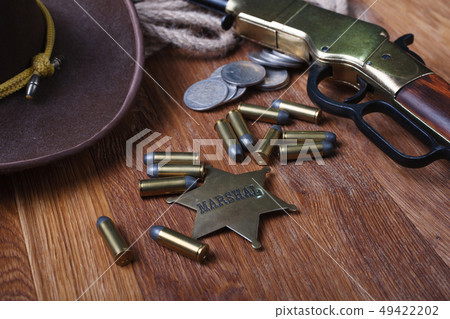 Wild west gun, ammunition and U.S. Marshal Badge 49422202