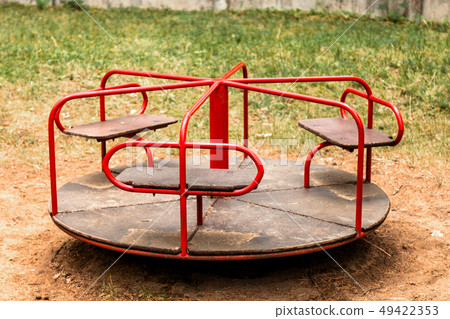 Children's carousel in the park 49422353
