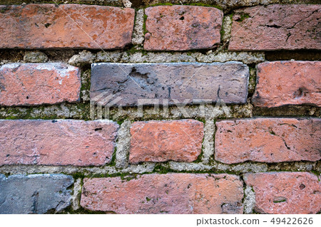 Old brick wall, old texture of red stone blocks closeup. Old brick wall, old texture of red stone blocks closeup. 49422626