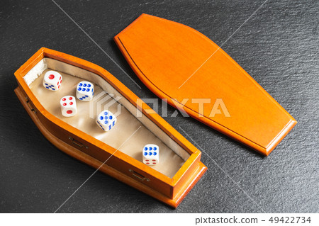 Life is a game concept.Dice in Coffin,gambling addiction Life is a game concept.Dice in Coffin,gambling addiction 49422734