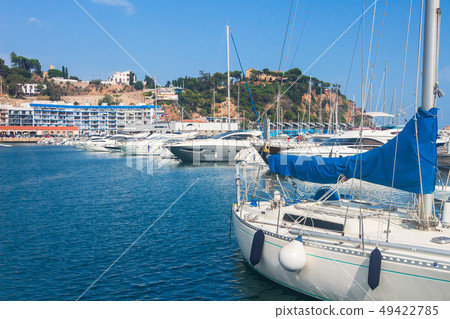 A White yachts in blue marina bay 49422785