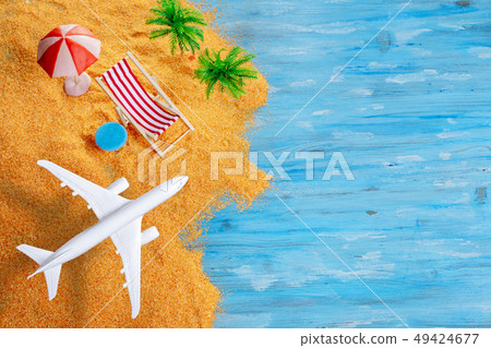 Aircraft over exotic beach with space 49424677
