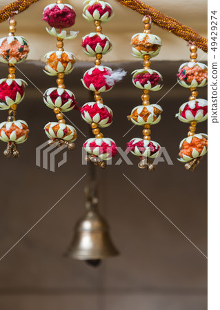 Colorful indian garland and bell Colorful indian garland and bell 49429274
