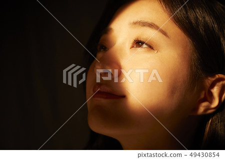 Woman expression tears 49430854