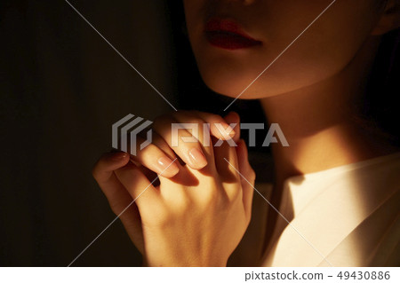 Woman wish prayer 49430886