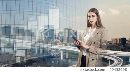 Beautiful business woman and modern business concept Beautiful business woman and modern business concept 49432098