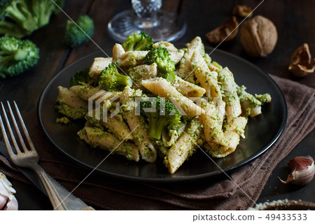 Wholegrain Pasta with broccoli and walnuts cream Wholegrain Pasta with broccoli and walnuts cream 49433533