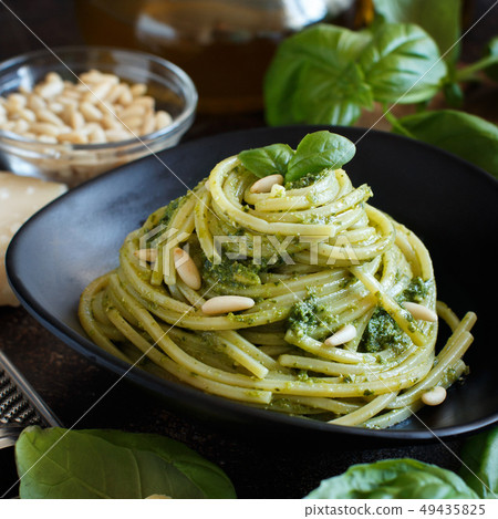 Spaghetti pasta with pesto sauce Spaghetti pasta with pesto sauce 49435825