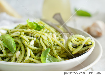 Spaghetti pasta with pesto sauce Spaghetti pasta with pesto sauce 49435863