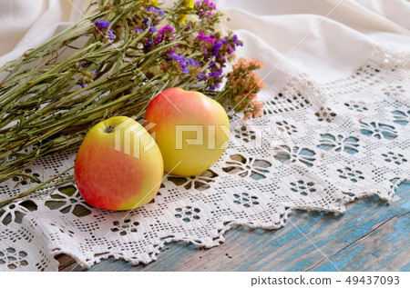 Still life with Limonium and apples 49437093