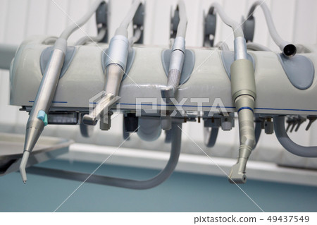 Group of dental tools and equipment. Group of dental tools and equipment. 49437549