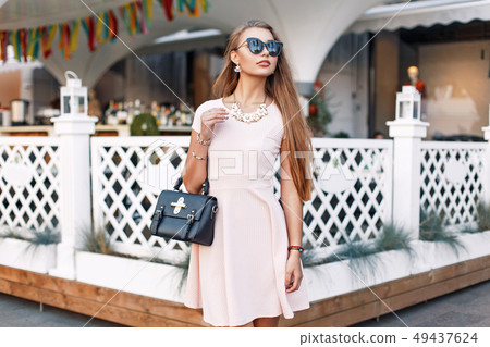 Fashionable beautiful woman in sunglasses 49437624