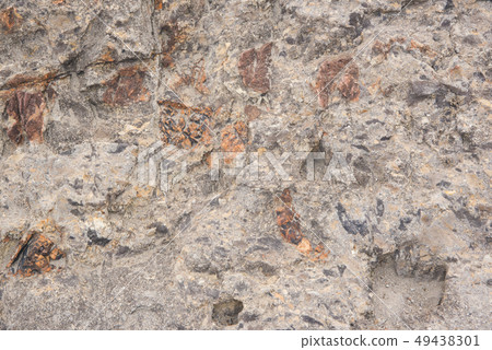 Gray and brown bumpy stones Gray and brown bumpy stones 49438301