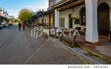 The vintage streets of the village of El Rocio with tourists 49438302