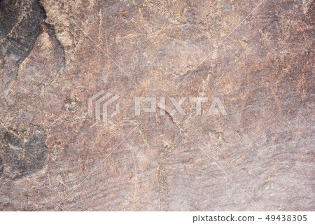 Brown and black bumpy stones 49438305