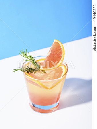 Cold and refreshing orange punch cocktail Cold and refreshing orange punch cocktail 49440251
