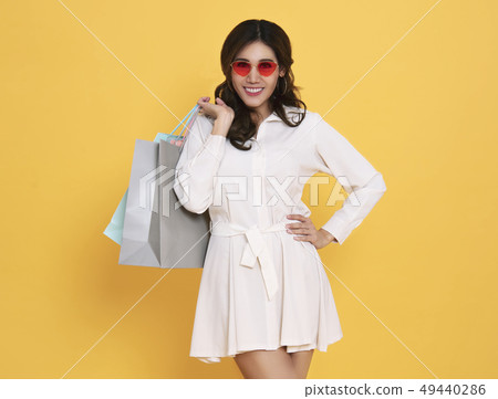 Portrait of an excited beautiful asian girl Portrait of an excited beautiful asian girl 49440286