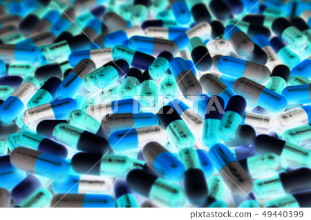 Pile of capsule pills. Pharmaceutical industry. 49440399