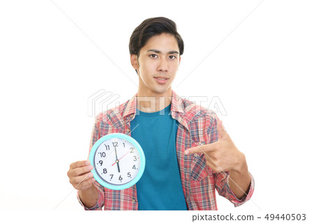 A smiling man with a watch A smiling man with a watch 49440503