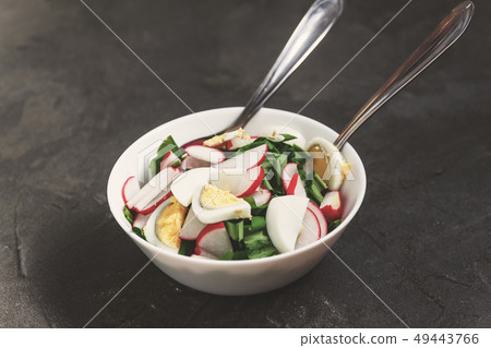 Vegetable vegan salad of ramson, radish, green Vegetable vegan salad of ramson, radish, green 49443766