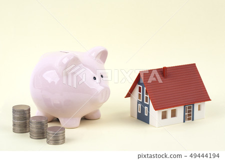 Piggy bank, coin and house 49444194