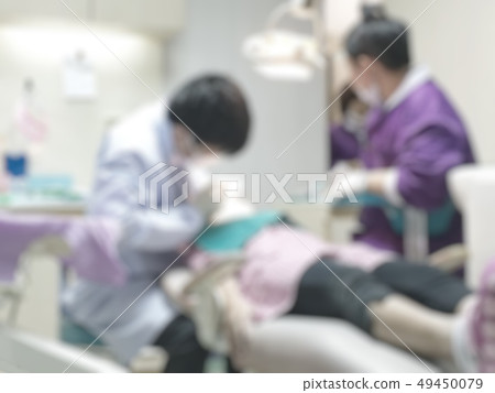 Dentistry blur background with dentist working  49450079