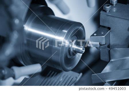The CNC lathe  cutting the thread. 49451003