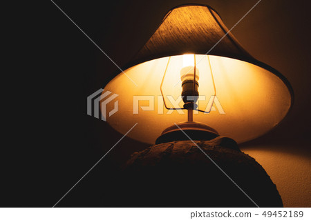 Livingroom lamp at night with dark background 49452189