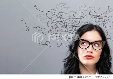 Solving a problem concept with young businesswoman Solving a problem concept with young businesswoman 49452772