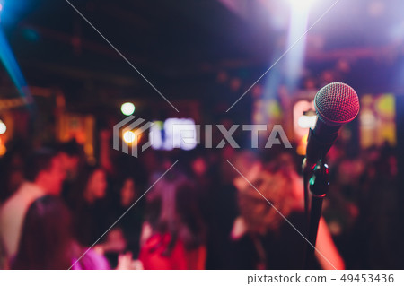 microphone against blur on beverage in pub and restaurant background. 49453436