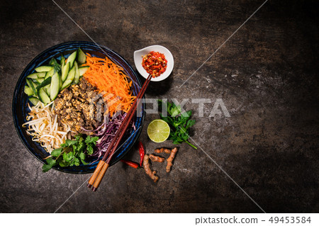 Asian food background with various ingredients on rustic stone background , top view. Asian food background with various ingredients on rustic stone background , top view. 49453584