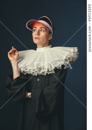 Medieval young woman as a nun 49453989