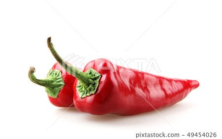 Close-Up Of Red Chili Pepper Against White Close-Up Of Red Chili Pepper Against White 49454026