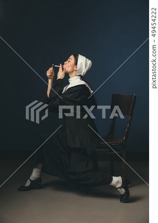 Medieval young woman as a nun Medieval young woman as a nun 49454222