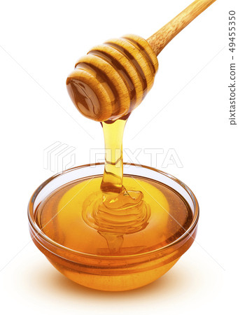 Honey stick and bowl of pouring honey isolated on white background with clipping path 49455350