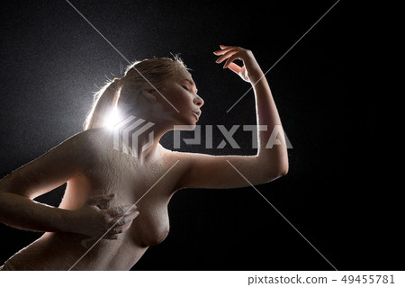 Blonde topless low angle shot in the dark Blonde topless low angle shot in the dark 49455781